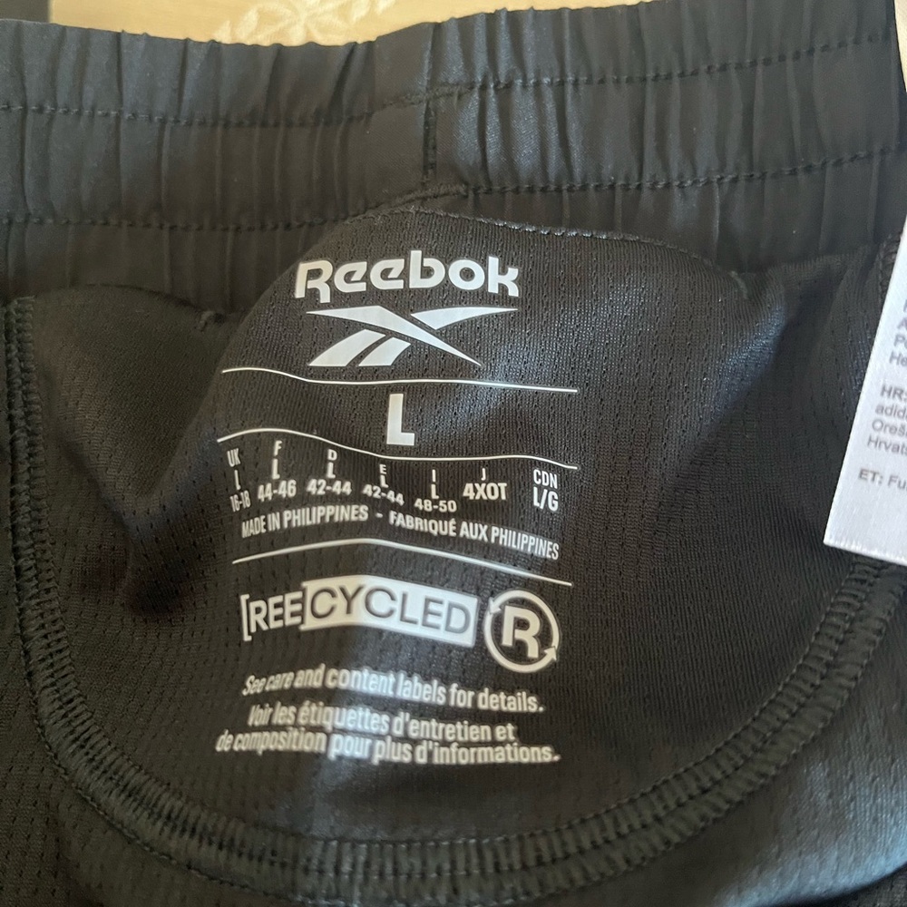 Women's running / training shorts by Reebok, size L - NWT